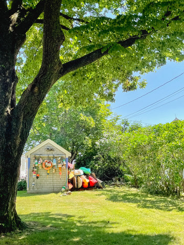 Colorful lobster buoys on a shed