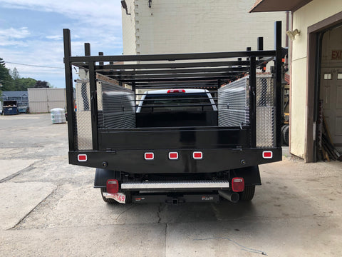 Custom built truck rack with weather guard tool boxes