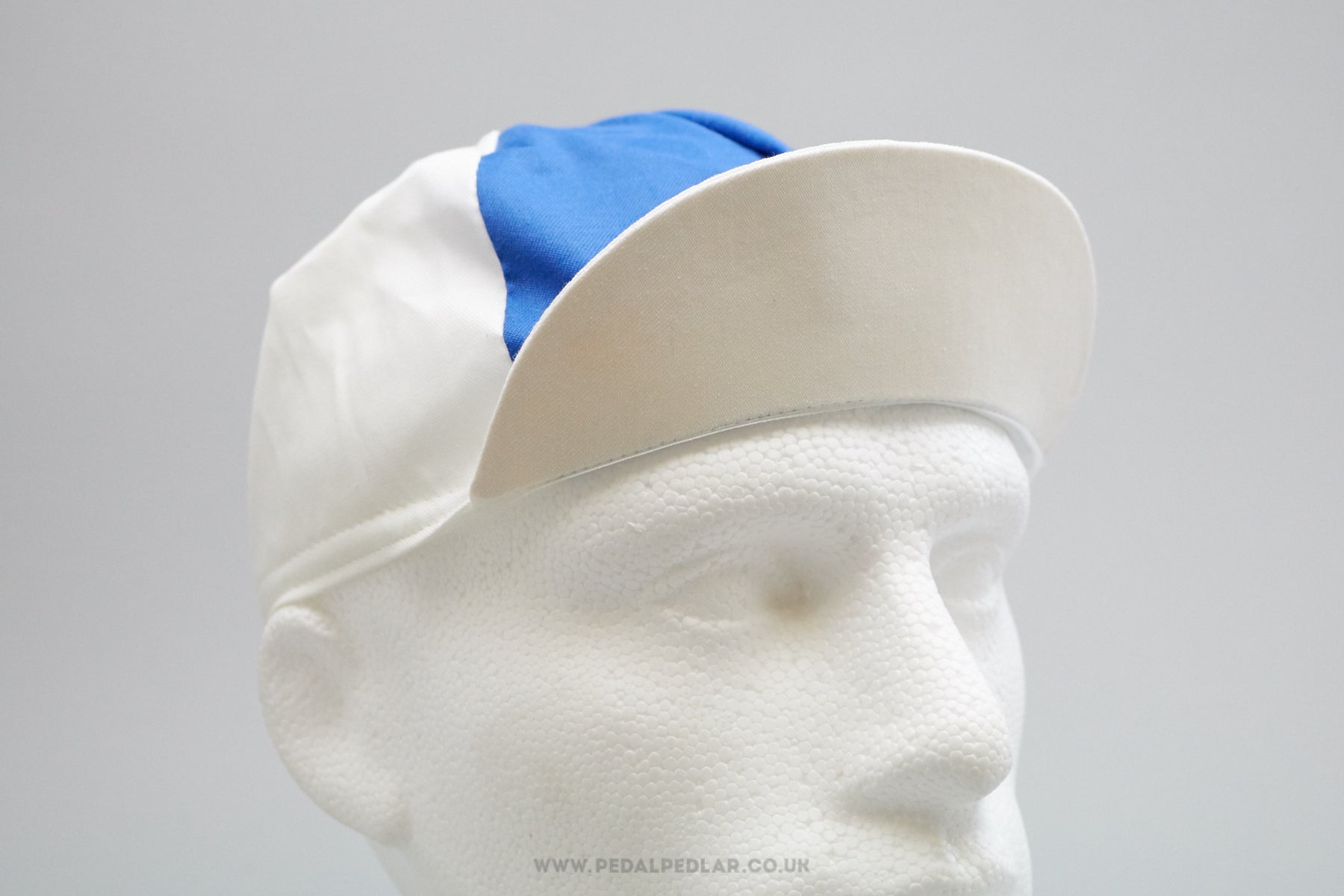 white cycling cap