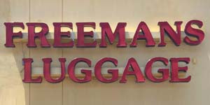 Freeman's luggage & gifts logo
