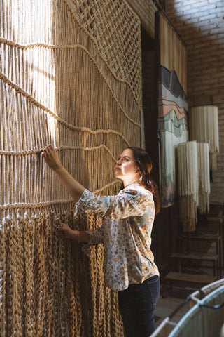 Mariella Motilla with a hand loom