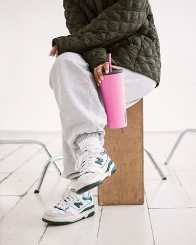 Girl Sitting With Stainless Steel Water Bottle