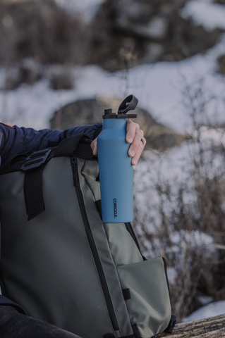 Man Holding Corkcicle Insulated Sport Canteen