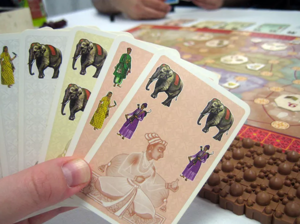 A hand of cards in Taj Mahal the board game