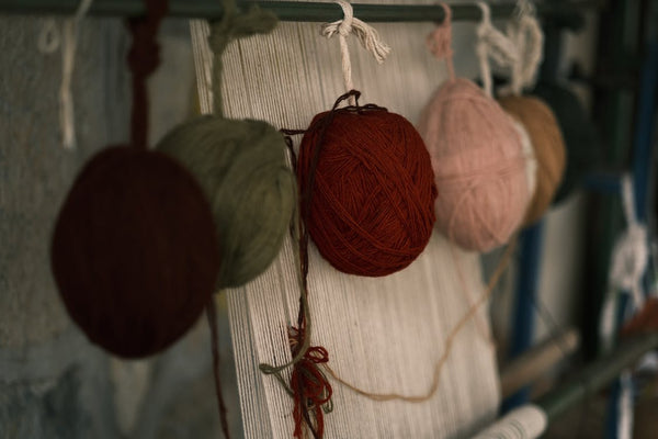 Sewing hanging threads in different colors