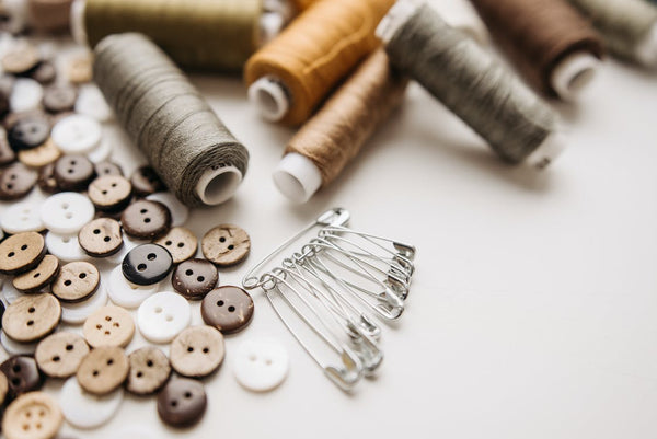 Sewing materials with safety pins