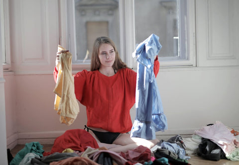 woman sorting the laundry