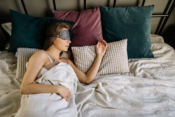 Girl with eyemask sleeping