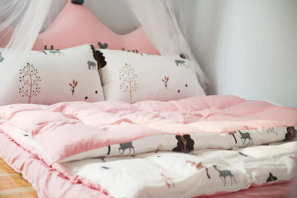 Pink and white comforter