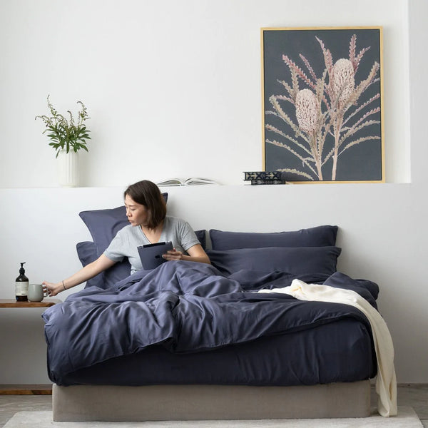 Featuring Weavve’s TENCEL™ Fitted Set Bed Sheets in Midnight Blue