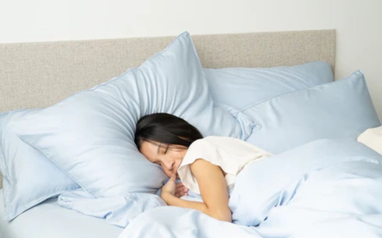 girl sleeping on the bed