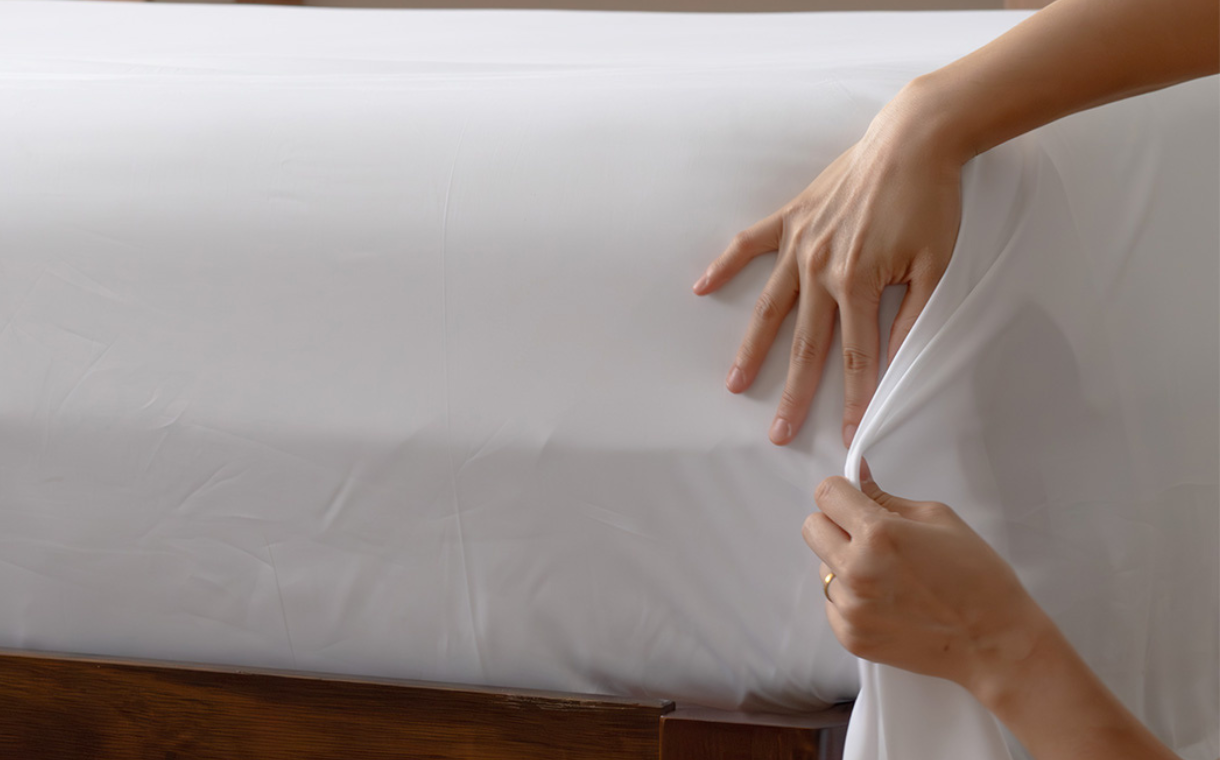 how to put on flat sheet on bed