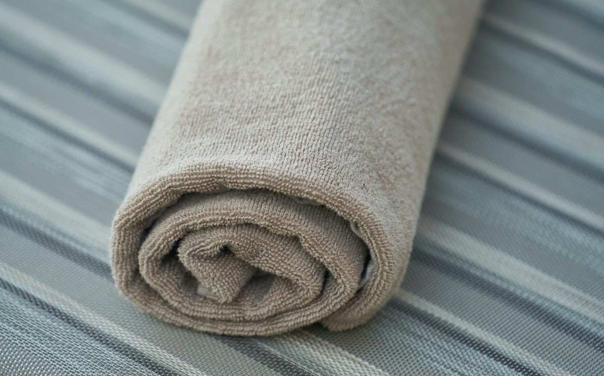rolled grey towel