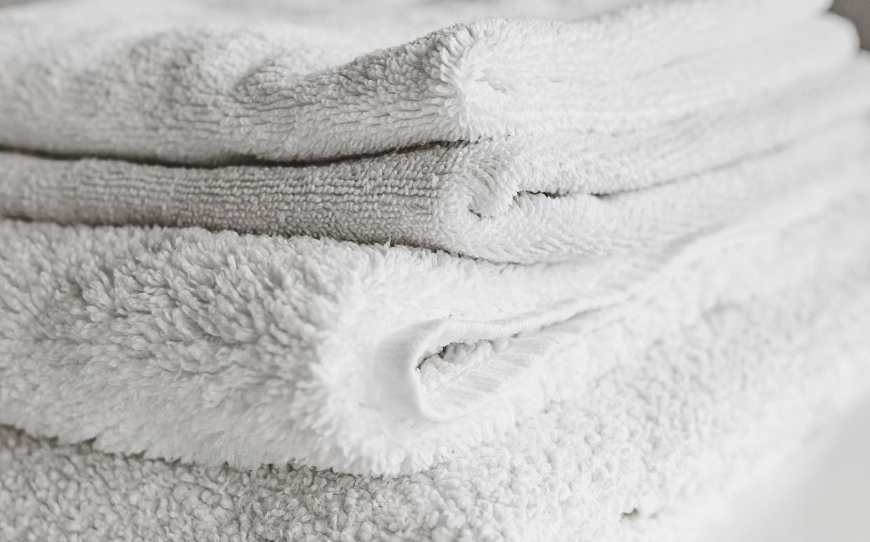 stack of folded white towels