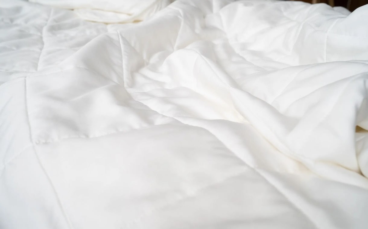 white lyocell duvet on bed