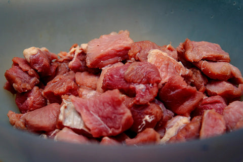 photo - raw lamb in a bowl for pet feeding, the Best Meat for Dogs