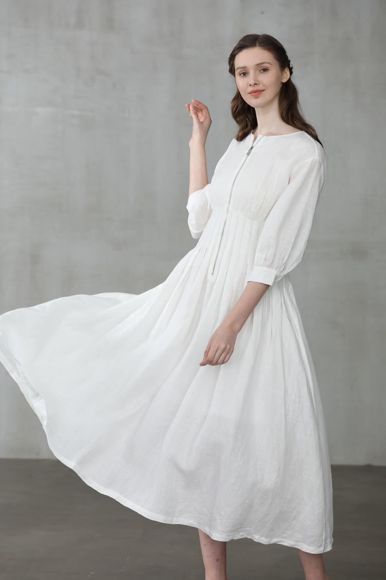 white linen flowing dress