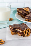 The pretzel crust in these Cheesecake Brownies gives an added dimension to the rich chocolate and creamy cheesecake. Every bite is delightful!