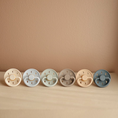 "Frigg Moonphase Silicone Pacifier: A Stylish and Safe Way to Soothe Your Little One!"
