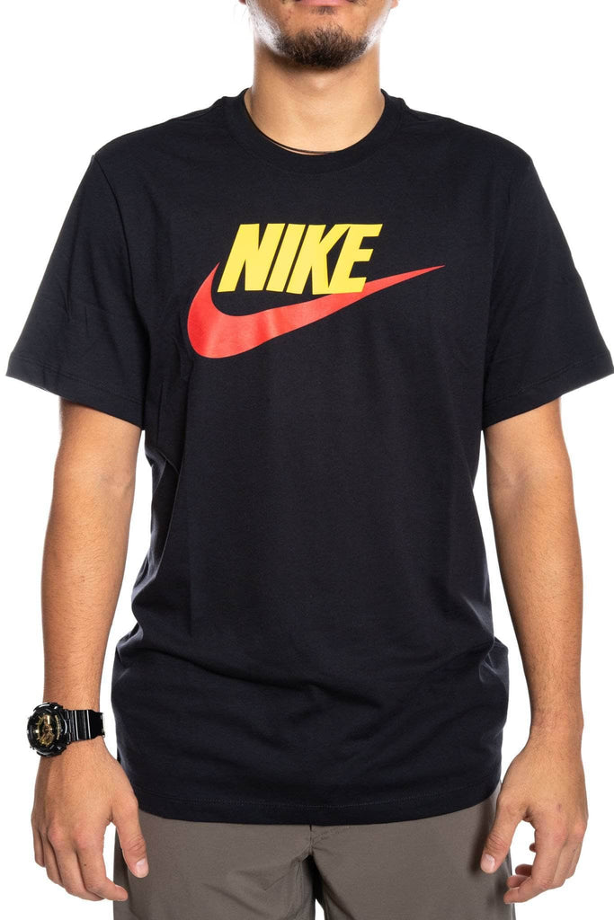 black red and yellow nike shirt