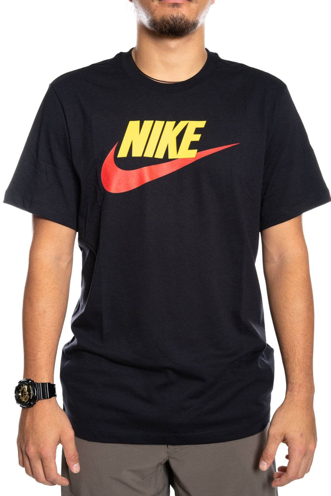 yellow and red nike shirt