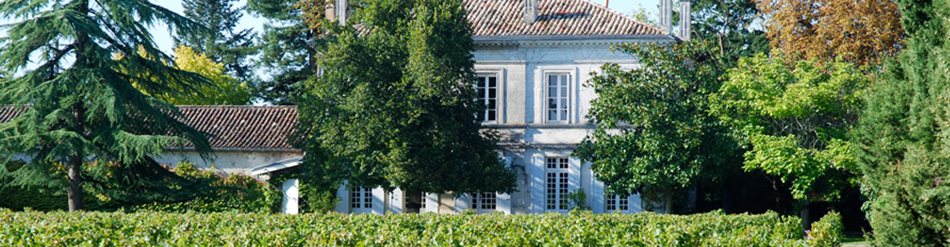 The Château Dutruch Grand Poujeaux with vineyards to the front