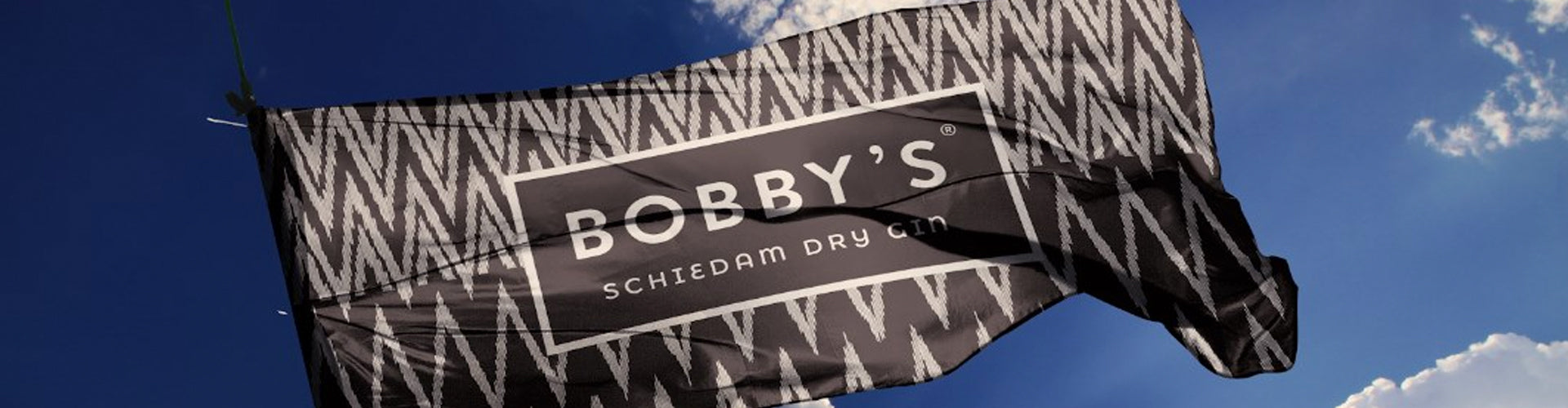 Bobby's Schiedam Gin Flag fluttering in sky
