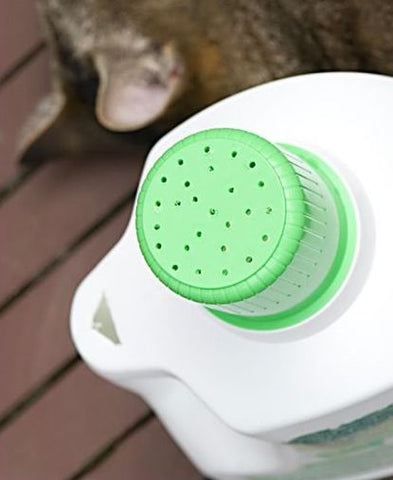 Holes in the cap of a laundry detergent bottle