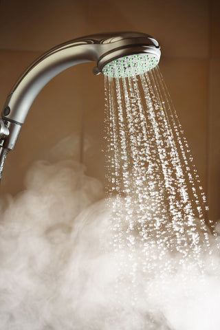 Smoke building up as water runs from shower head