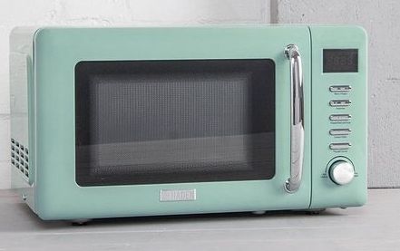 Green microwave on a counter