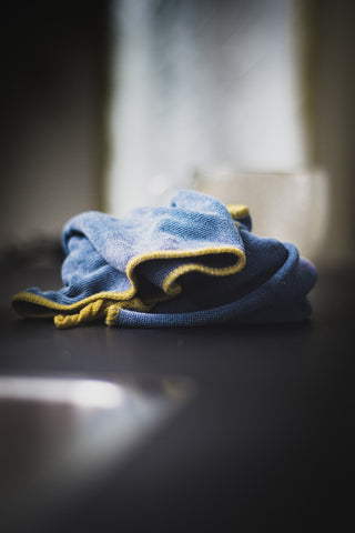 Blue used cloth lying on the counter