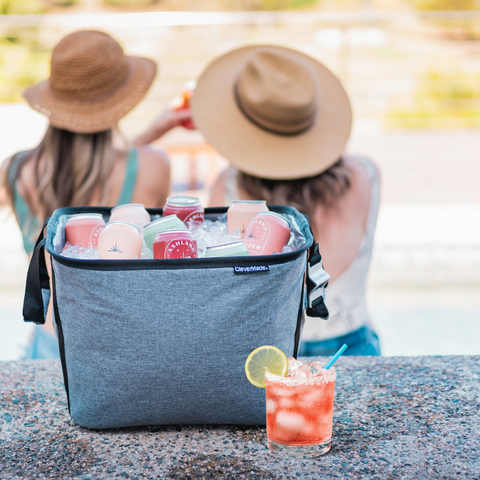 clevermade party tub with a margarita and girls sitting by the pool