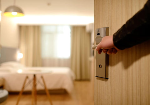 Entering a hotel room. Photo by Pixabay.