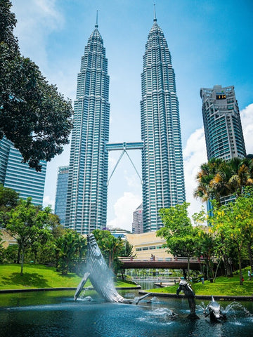KLCC Twin Towers with the Symphony Light Lake during the day. Photo by Phearak Chamrien.