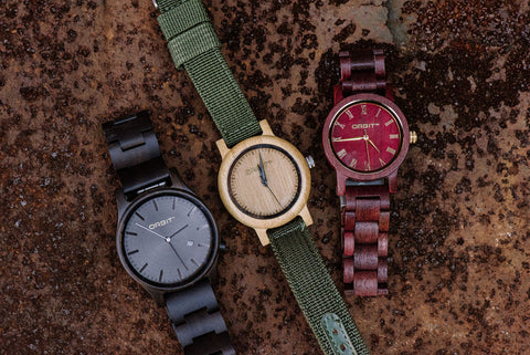 three orbit wooden watches