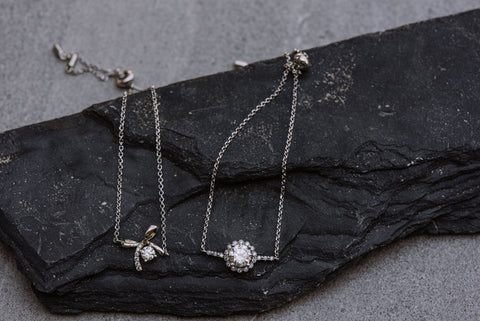 two moissanite necklaces