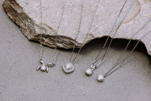 collection of sterling silver moissanite necklaces