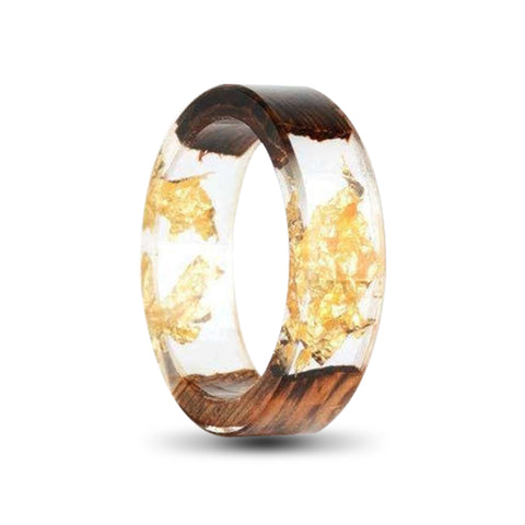 transparent resin ring with wood and gold foil inlays 