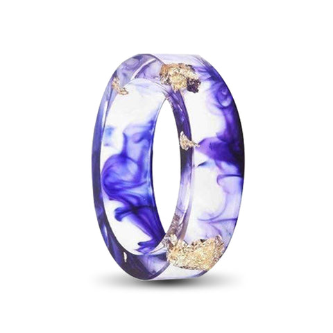 transparent resin ring with purple ink and gold foil inlay