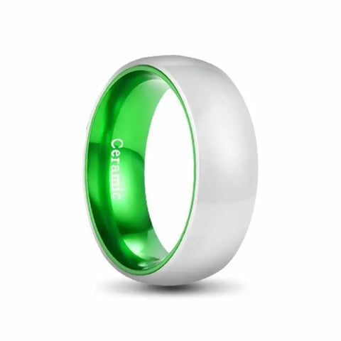 Silver and Green Ceramic Ring on White Backdrop