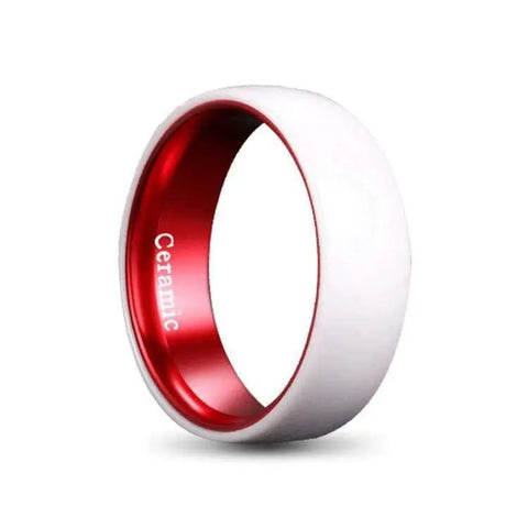 Silver and Red Ceramic Ring on White Backdrop