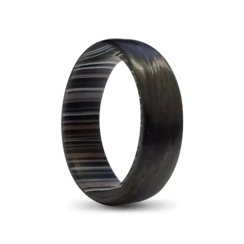 Black Carbon Fibre Ring with Fordite Inner on White Backdrop