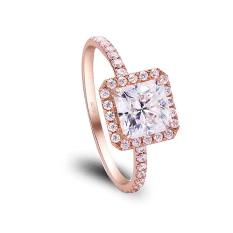 Rose Gold Moissanite Ring With Square Radiant Cut Diamond on White Backdrop