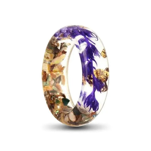 Transparent Resin Rings Filled With Dried Flowers and Foil