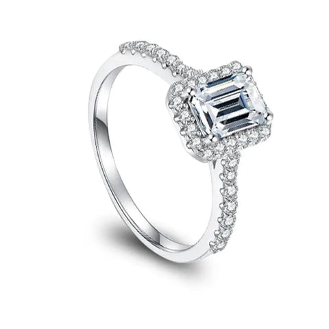 Sterling Silver Moissanite Ring with Emerald Cut Moissanite Stone surrounded by Zirconia Stone Inlays