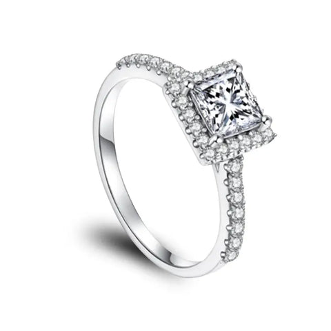 Sterling Silver Ring With Emerald Cut Moissanite Main Stone Surrounded by Zirconia stones