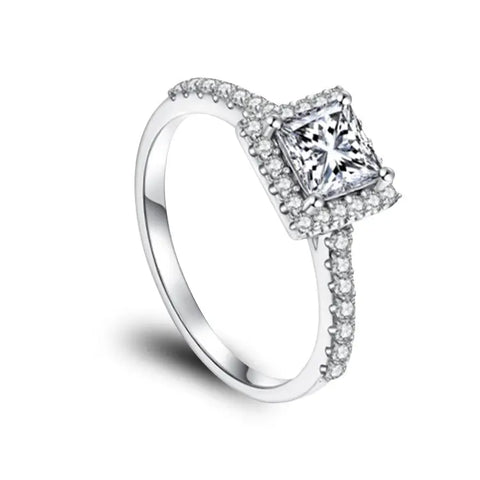 sterling silver moissanite ring with emerald cut moissanite stone surrounded by zirconia stones