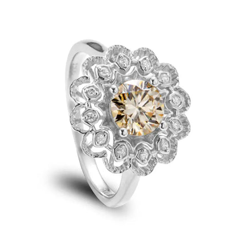 Sterling Silver Ring With Flower Shape and Champagne Coloured Moissanite Main Stone and Zirconia Stones on Pattern