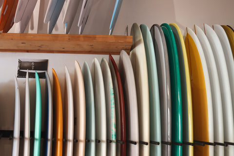 The board rack at Sunburnt Mess. From Single fins, Bonzers, & Twin fins, to Fish, Quads, Midlengths and Logs. 