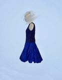 Blue lace hand sequinned top and separate blue taffeta skirt.